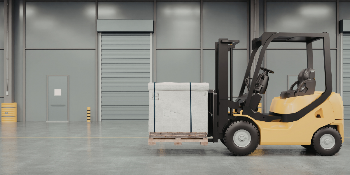 forklift truck carrying a large item in a warehouse